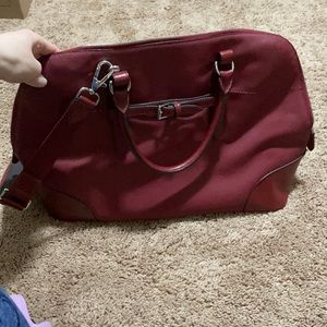 Tumi Red Leather Carry On bag